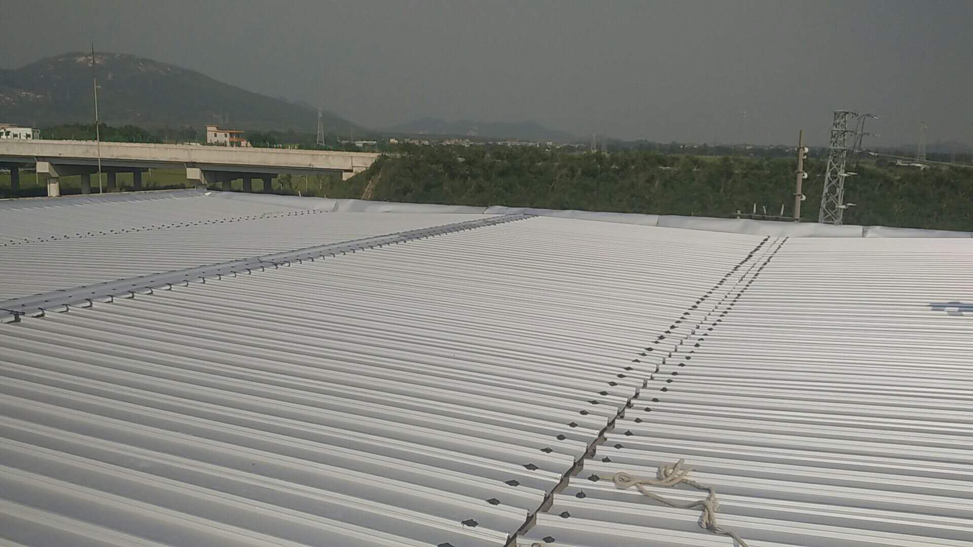 中油BP斗山二号油站替换油棚屋面瓦工程